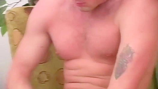 Barrett Long Strokes His Slim Body Over a Massive Bed