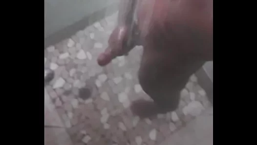 Gay Man Enjoys Handjob and Dick Play in Steamy Shower Session