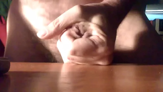 Handjob Leads to Hot Cumshot on Table in AmateurGayPorn Clip