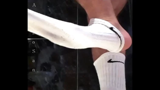 AnzzoSan Teases with Hairy Dick and Sock–clad Feet in Seductive Foot Fetish Scene