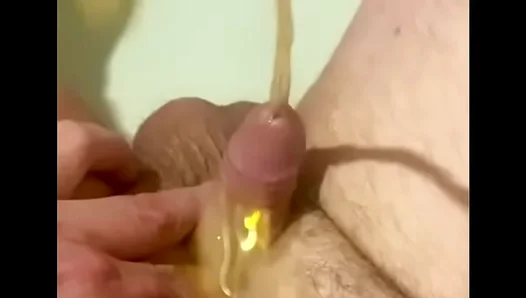 Amateur Guy Enjoying a Unique Pissing Experience in POV Style