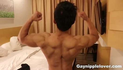 Asian Muscle Guy Enjoys Hot Nipple Play and Muscle Worship in Edgy Gay Scene