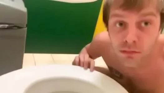 Public Bathroom Humiliation – Naked Fag Gets Rough Toilet Action