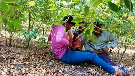 Three College Students Romance Passionately In A Flower Field During Their Afternoon Break