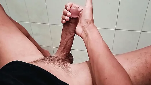 Horny guy alone in bathroom stroking BIG COCK until he shoots a HUGE CUMSHOT