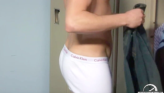 Jacked Brunette Shows Off His Moves in the Locker Room