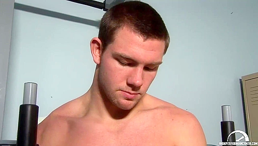 Jacked Brunette Shows Off His Moves in the Locker Room