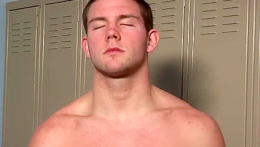 Jacked Brunette Shows Off His Moves in the Locker Room