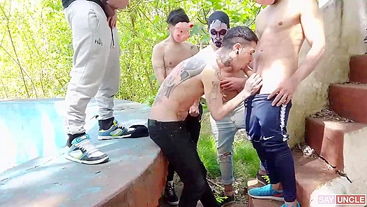 Creepy Masked Dudes Pound Each Other in Wild Outdoor Gang-Bang