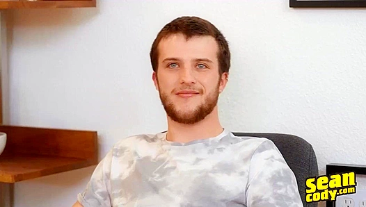 Tattooed Stud Masturbates Intensely on Luxurious Couch